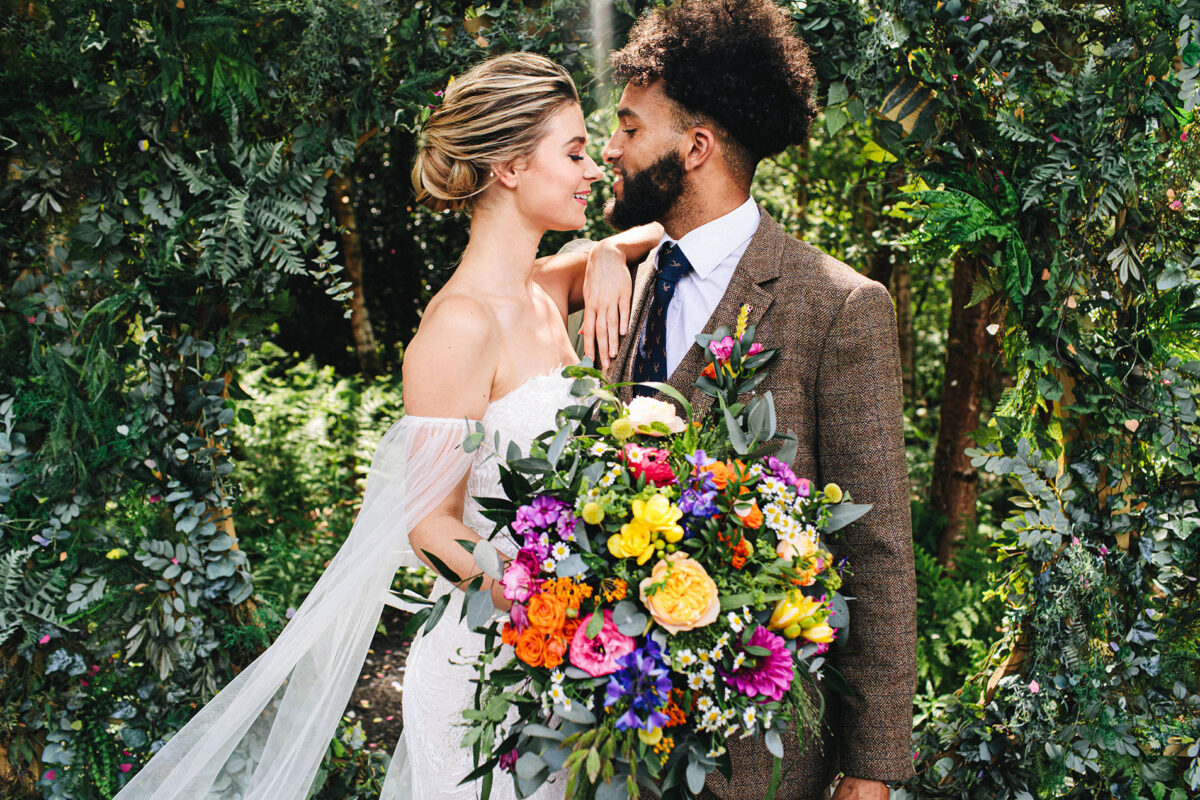 colourful-wedding-shoot-woodland-weddings-bright-bold-rustic-venue-bouquet-and-bells